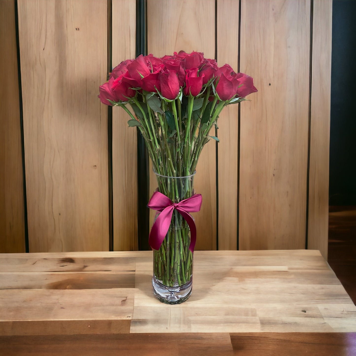 50 Stem Red Roses with a Clear Illusion Vase